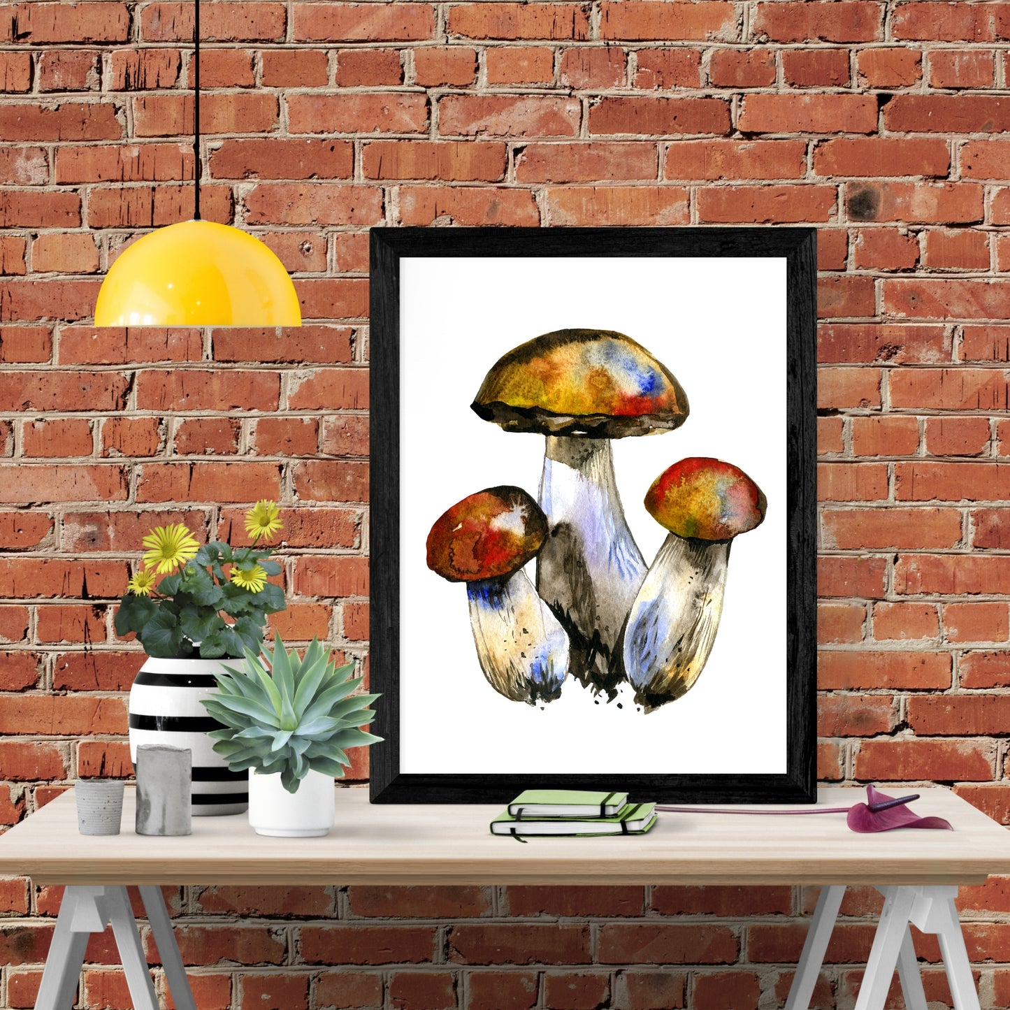 Leccinum Mushrooms Watercolor Fine Art Print displayed in a stylish frame against a rustic brick wall backdrop.