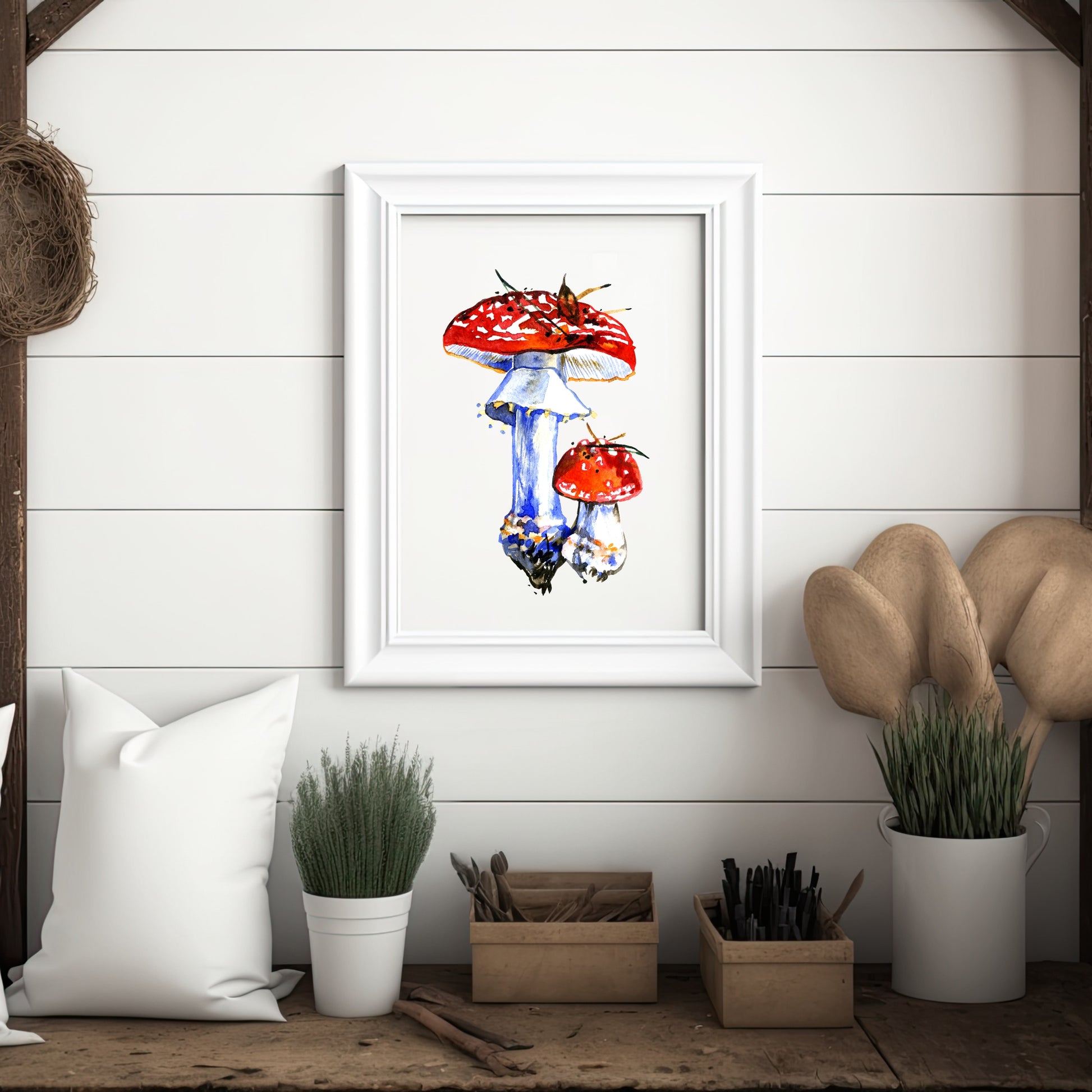 Beautiful Fly Agaric Mushrooms Watercolor Fine Art Print displayed in a stylish frame, perfect for any art lover's home.