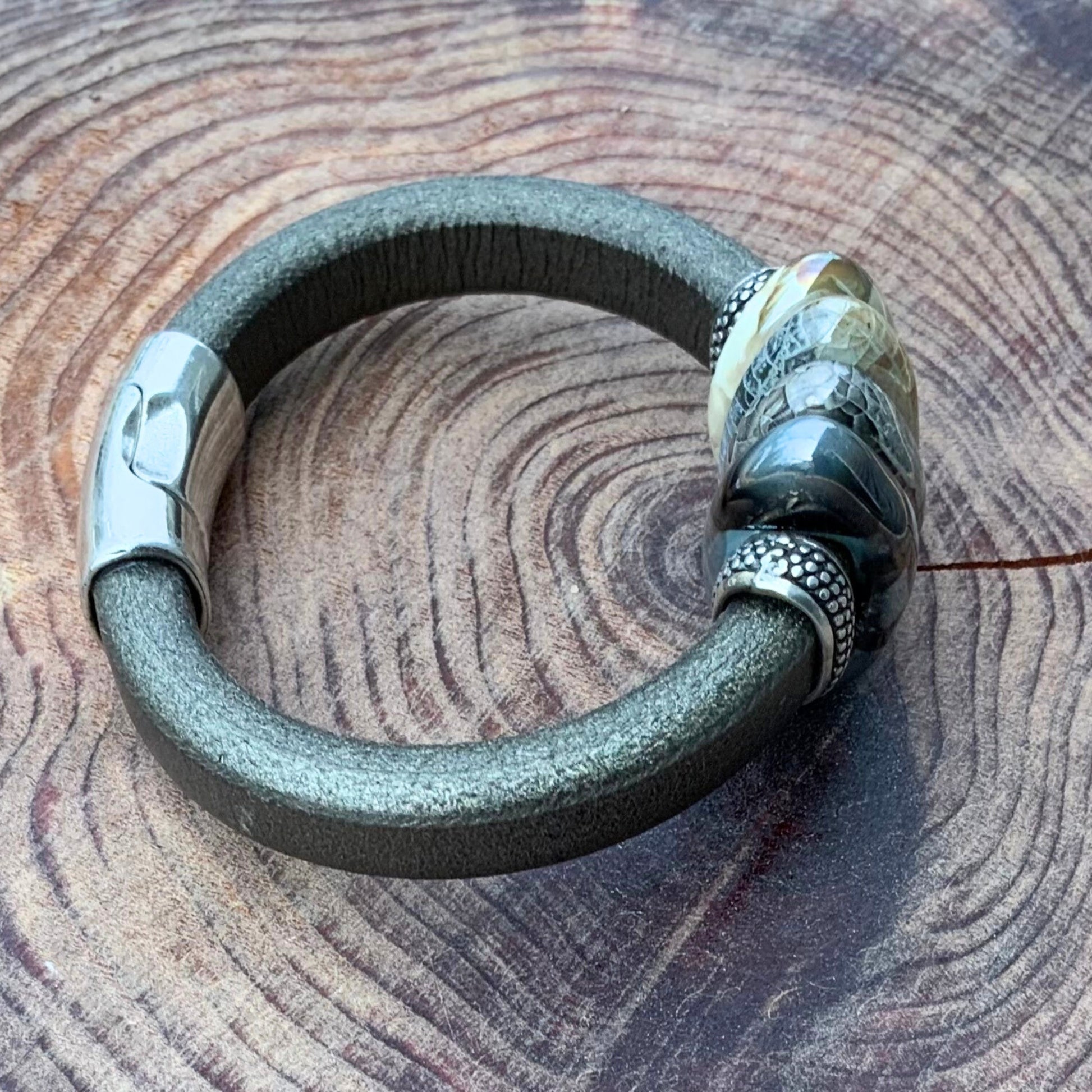 Stylish Sparrow Leather Ceramic Bracelet featuring shimmery champagne leather and unique artisan ceramic beads.